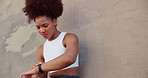 Outdoor, sad and woman with smart watch for fitness, check time and wellness for workout by wall. Mockup, female person and disappointed with clock for exercise steps, health rest or results by below