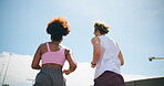 Active, couple and running for fitness on bridge for exercise, cardio and workout of marathon practice. Below, people and sports training of endurance performance, partner support and morning routine