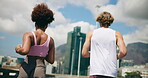 Back, couple and running for fitness in city for exercise, cardio and workout of marathon practice. Athlete, people and sports training for endurance performance, partner support and morning routine