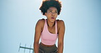 Tired, African woman and outdoor with break for fitness, breathing exercise or cardio wellness. Below, fatigue and athlete in stadium for calm, running activity or training rest with space in Nigeria