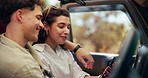 Road trip, phone and couple in car for travel on holiday, vacation and adventure for navigation. Countryside, smartphone and man and woman talking in vehicle for transport, journey and driving