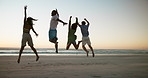 Beach, jumping and friends with vacation, back and bonding together with happiness. People, outdoor and seaside with summer holiday, energy and sunset with ocean, travelling and fun in Zanzibar