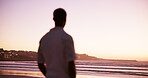 Back, person and thinking at beach outdoor in summer, planning travel and vacation memory. Man, thoughts and peace with ideas for reflection, calm morning and sunset view for holiday trip in Florida