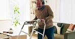Walker, dance and senior man with headphones to celebrate injury recovery, mobility improvement and success. Music, retirement and excited person with disability, walking frame and energy in home