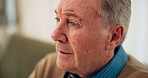 Home, senior man and thinking in retirement with depression, mental health and remember past memory. Sofa, male person and pensioner with anxiety for nostalgia, dementia and lonely in nursing house