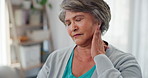 Home, neck pain and senior woman in lounge, inflammation and muscle tension with bruise. Pensioner, discomfort and old person in living room, broke and pressure with joint injury, ache or health risk