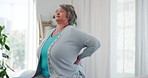Home, back pain and senior woman with joint injury, muscle tension and osteoarthritis. Pensioner, apartment or mature person with inflammation, medical crisis or morning with agony, ache or arthritis