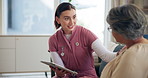 Nurse, senior woman and consulting with tablet on sofa, questions and survey for wellness in retirement home. Elderly person, talk and digital touchscreen, app or smile with health advice in lounge