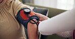 Healthcare, patient and hands of nurse for blood pressure, diabetes assessment and medical check up in home. Caregiver, test and pump on person arm for diagnosis, hypertension level and consultation