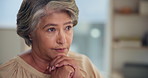 Home, thinking and old woman with stress, hands together and breathing with financial pressure. Apartment, pensioner and mature person in lounge, prayer and nostalgia with memory and reflection