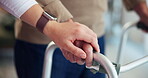 Nurse, hands or elderly patient with walker, support or help for healthcare or Parkinsons in hospital. Senior people, caregiver or comfort with closeup, assisted living or old person with disability