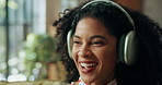 Headphones, music and happy woman dance in home, streaming sound or playlist subscription on weekend. Living room, audio technology and African person listening to favorite song, radio and kpop