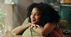 Relax, thinking and African woman in home with ideas, inspiration and daydreaming on sofa. Peaceful, morning and happy person in living room with daydreaming, wellness and reflection on weekend