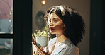 Coffee, thinking and African woman by window with ideas, inspiration and daydreaming in home. Happy, morning and person in living room with drink for daydreaming, wellness and satisfaction on weekend