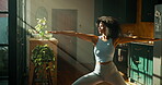 Yoga, woman and stretching in home for fitness, wellness and balance for holistic exercise. Pilates, girl or relax in warrior pose for meditation, calm and muscle tension relief in warm up in morning