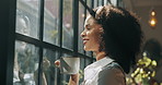 Coffee, thinking and happy woman by window with ideas, inspiration and daydreaming in home. Relax, morning and person in living room with drink for daydreaming, wellness and satisfaction on weekend