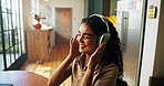 Happy, music and woman in home with headphones for streaming, radio subscription and audio. Apartment, dance and person listening to song, track and playlist to chill, relax and calm on weekend