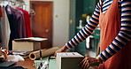 Woman, box and order for small business, clothes and creative fashion boutique startup with online sales. Designer, owner and distribution for store packaging, retail service and ecommerce delivery
