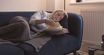 Mature woman retirement, reading book and living room sofa, couch and apartment, peace and book club hobby in Australia. Older female relax lifestyle, literature and story books in home lounge
