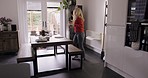 Happy, crazy and dance of woman in kitchen with food dishes for victory, achievement or wellness. Excited, happiness and comic girl dancing with feel good mood for personal success in home.

