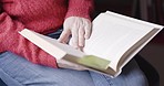 Mature woman, reading book and relax for hobby, comfort and leisure in New Zealand home lounge. Lady enjoy free time, story books and book club literature, learning information and knowledge in house