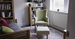 Armchair, sofa or furniture in relax home library, living room or psychology counseling clinic in mental health, stress management or self care. Empty room, couch or lounge seat in counseling therapy