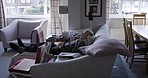 Home, recovery and senior man sleeping on living room sofa for injury healing, accident rehabilitation and healthcare. Retirement, stress relief and elderly person relax on couch while nursing legs