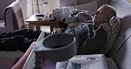 Rehabilitation, home and senior man with knee pain resting on sofa after surgery. Healthcare, wellness and old man laying on couch in living room with pain, injury and   recovery in retirement home