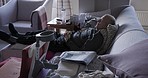 Senior man, retirement and rehabilitation of healthcare, surgery or physical therapy patient. Sleeping elderly nursing home person on a sofa resting and relax after health clinic therapy at a house