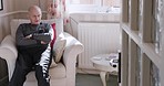 Senior man, sitting and thinking on sofa in home with memory, idea or retirement in home living room. Elderly contemplating, arms crossed and mindfulness on couch in nursing home, apartment or lounge