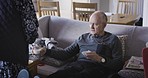 Breakfast, help and senior man eating with wife for health, care and rehabilitation from accident. Disability, caregiver and elderly man with food for strong body and healthcare in a nursing home