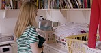 Folding, cleaning and woman with clothes for laundry, organise and sort for wardrobe in her house. Clean, service and cleaner with clothing to fold in her closet for washing, housework and tidy home
