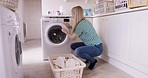 Washing machine, laundry and woman cleaning fabric for home care, apartment housekeeping or domestic life routine. Electrical dryer, service cleaner and maid with basket container of cotton clothes