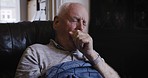 Sick, cough and sneezing old man blowing nose, tissue and illness in living room. Throat pain, thyroid cancer and senior sneeze, flu and cold, covid 19 and corona virus, health or acid reflux problem