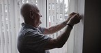 Happy senior man, window blinds and looking outdoor with happiness, excited and smile in bedroom. Retirement, elderly gentleman and wave hand by glass in nursing home. apartment or house in London