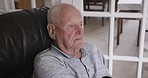 Senior man, relax and living room sitting of a elderly person in a retirement nursing home. Thinking old face of a male in a home calm on a lounge sofa with peace and rest lifestyle on a couch