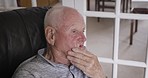 Thinking, depression and sad senior man on sofa alone and hopeless with mindset problem in home. Elderly male with mental health from anxiety, worry and stress about negative thoughts in lonely mind