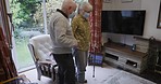 Husband support wife to walk, rehabilitation and senior care with walking stick help. Couple in retirement home together, assistance with standing up and elderly woman with face mask indoors