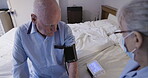 Blood pressure, assisted living and healthcare with a woman nurse testing a man patient for cholesterol. Medical, health or cardiovascular with a female carer doing a checkup on a senior male at home
