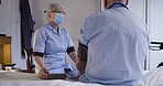 Old man with nurse, health and blood pressure check with machine, retirement and nursing home. Medical care, wellness and aging with cardiovascular healthcare, woman in face mask and caregiver