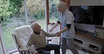 Nursing home, nurse and senior man in living room for healthcare, rehabilitation and medical support. Disability assistance, retirement and caregiver helping elderly patient from relaxing on couch