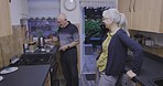 Elderly, kitchen cooking and senior couple talking by a stove ready for eating dinner at home. House, marriage and retirement of old people with communication and care together with happiness