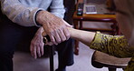 Hand holding, love and senior couple with care, support and hope in retirement home and touching for comfort. Elderly, old and closeup of mature people with trust together and walking stick as help