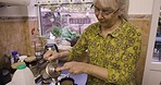 Retirement, kitchen and elderly couple with coffee for breakfast together talking, chatting and conversation. Nursing home, relax and old man and woman prepare tea, hot beverage and drink in morning