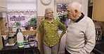 Coffee, conversation and retirement, couple in kitchen talking and planning day at breakfast time in home together. Morning chat, drink and old man with woman making tea, marriage with smile and love