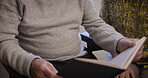 Book, relax and senior couple reading story together, bonding and enjoying quality time in house. Love, storytelling and elderly retired man and woman study or read novel, literature or books in home