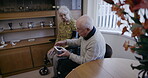 Health, blood pressure and wheelchair with an old couple together in their retirement home for wellness. Medical, cardiovascular and cholesterol with a mature man and woman testing for hypertension
