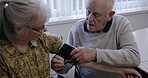 Health, blood pressure and a senior couple together in their retirement home for a wellness checkup. Medical, cardiovascular and cholesterol with a mature man and woman testing for hypertension