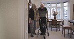 Senior couple, disability help and love with old woman support partner with a walker. Trust, marriage care and nursing home with elderly people together in retirement house and living room lounge