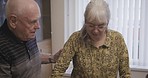 Senior couple, help and support with elderly woman with a disability and man helping with empathy. Love, partner care and marriage of people in retirement and nursing home together with compassion